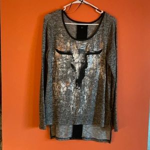 Western print top.It’s never been worn.